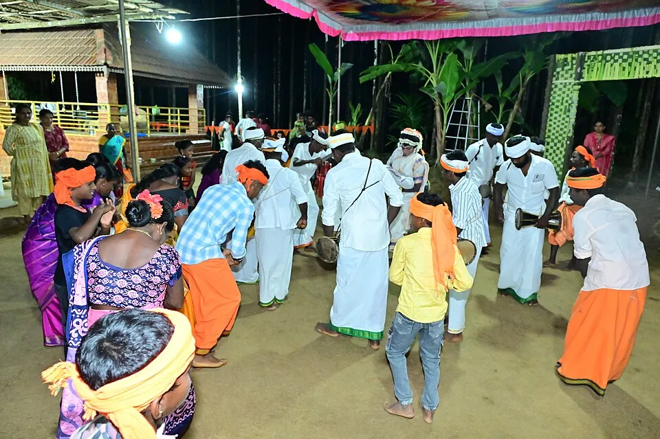Members of the Mugera community performing Chennu Nalike at night