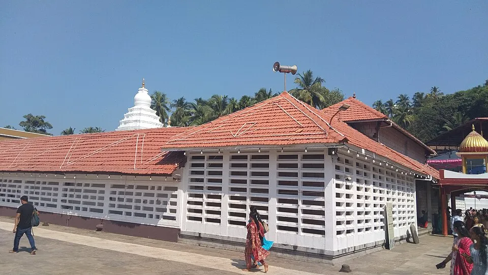 The Kadri Manjunatha Temple in Mangaluru, with a tiled roof and a white tower