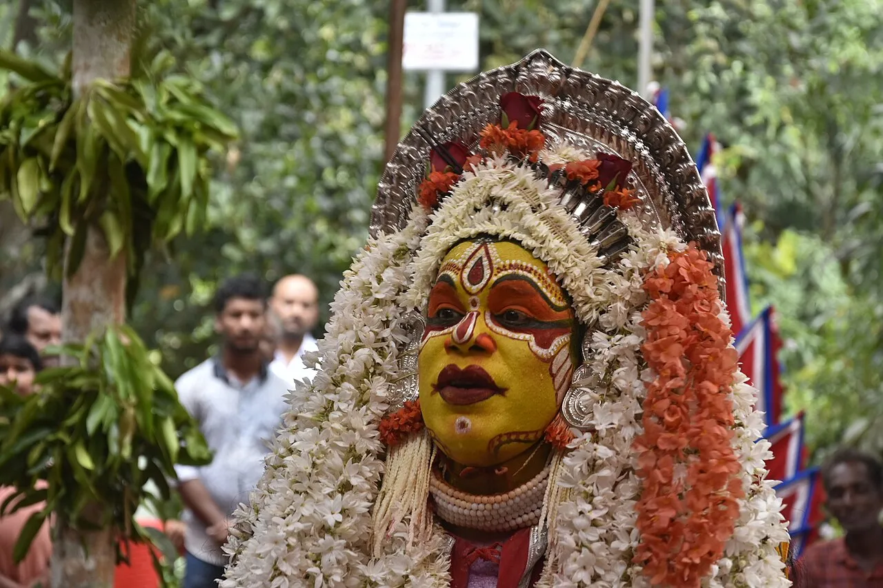 A performer as the daiva Dhumavati during a nema