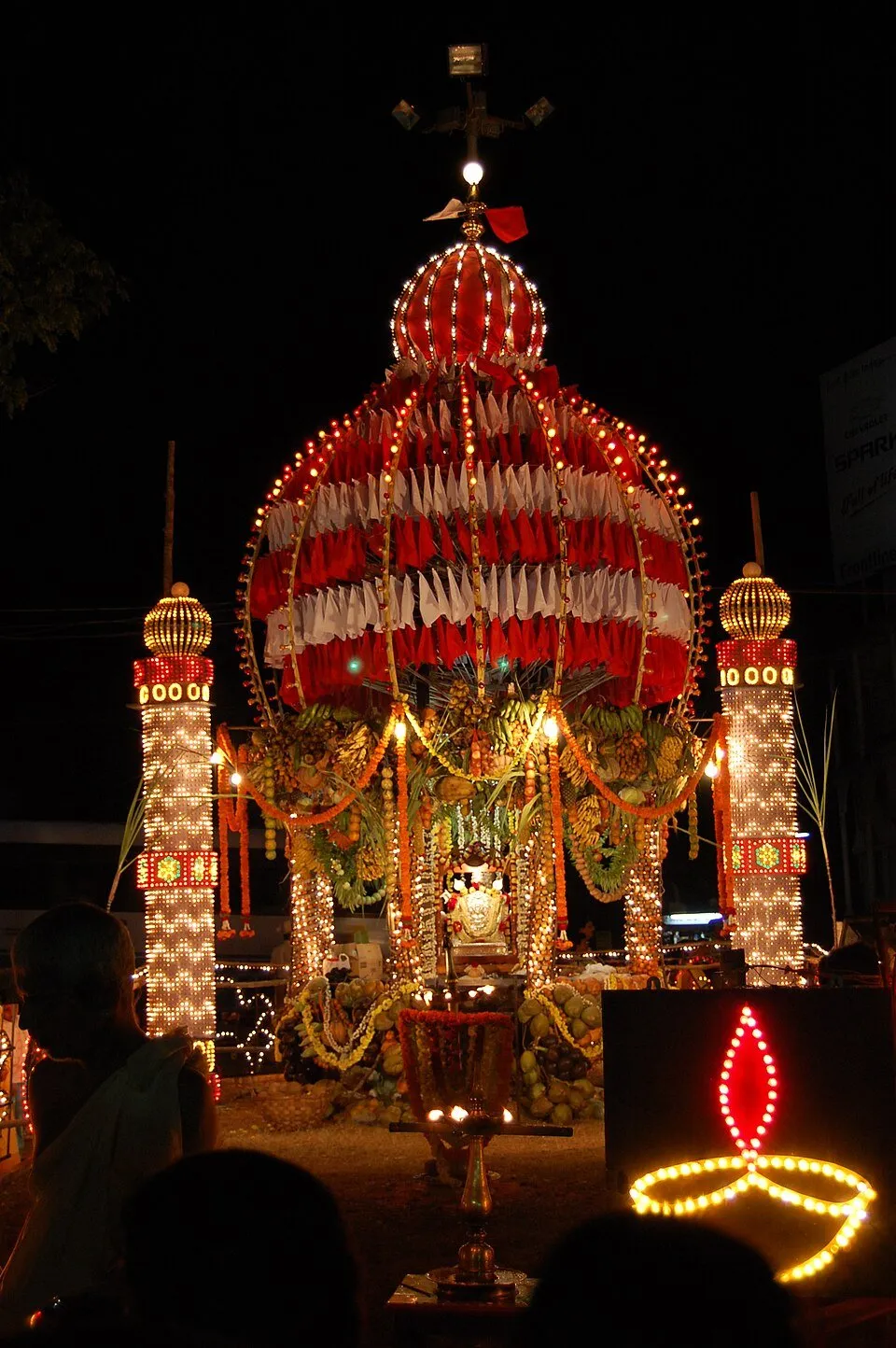 The Sharavu Mahaganapathi idol on a chariot of flowers, fruit and vegetables at the Gurji Deepotsava